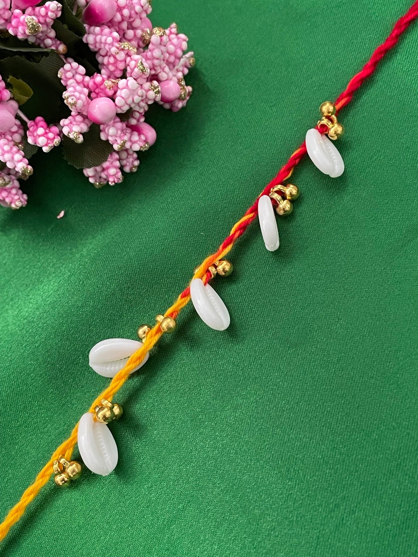 Sea-shell With Ghungroo Rakhi Bracelet for Raksha Bandhan