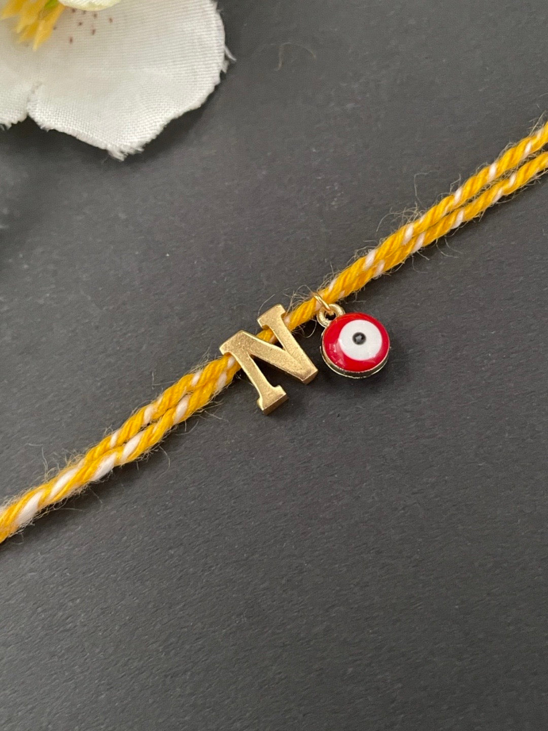 Initial Letter Rakhi