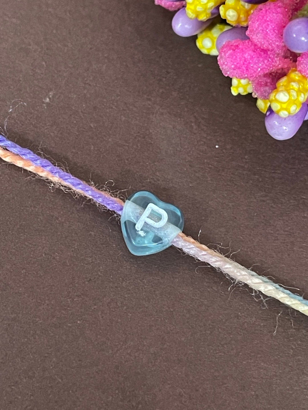 Initial Letter Rakhi