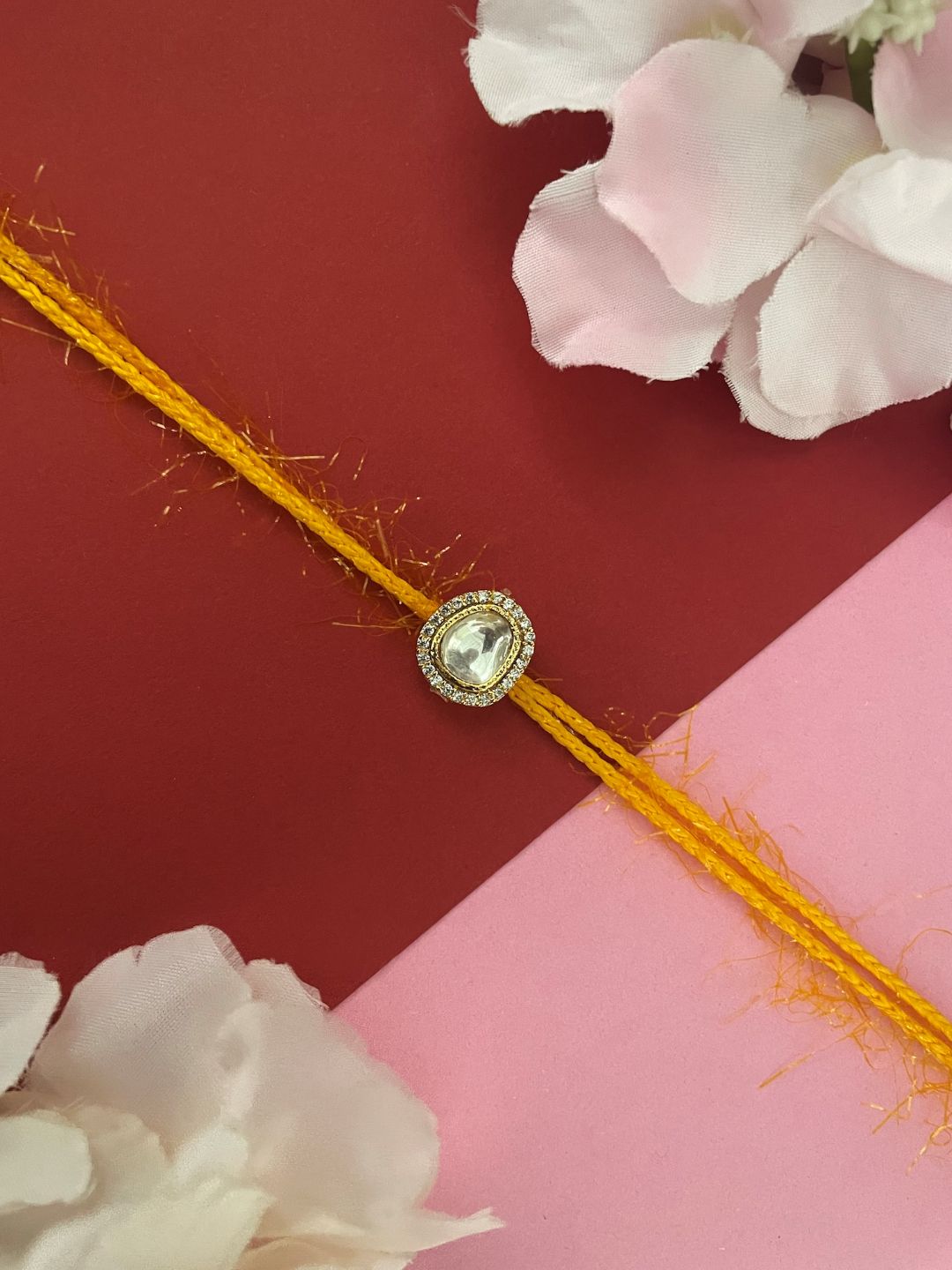 Kundan/AD Oval Shape Rakhi Lumba