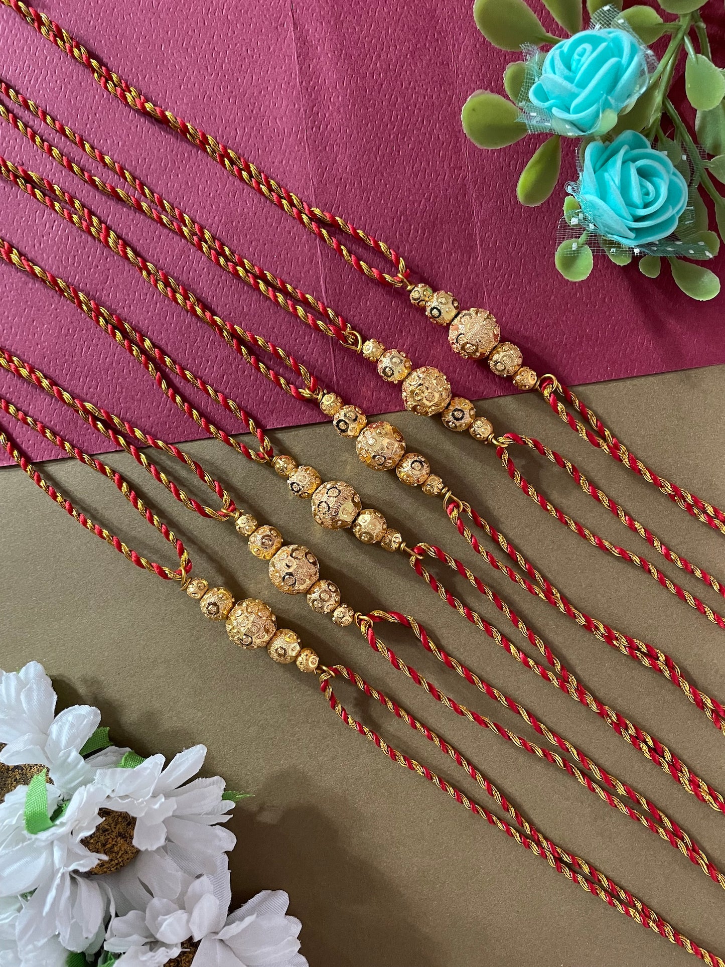 (Set of 6) Gold Plated Ball Rakhi Lumba