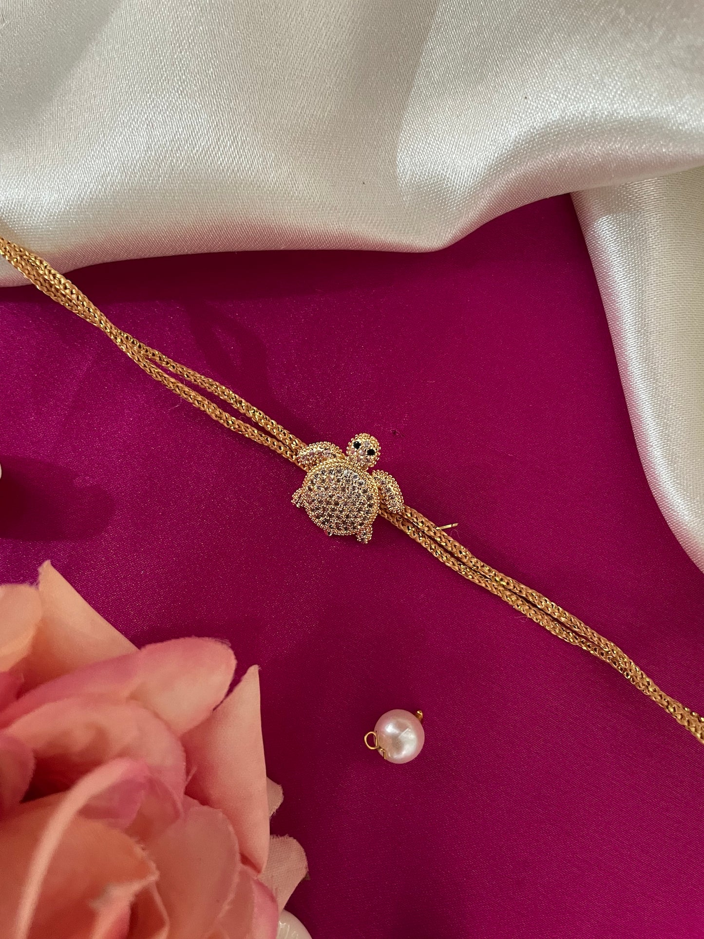 AD Tortoise Charm Rakhi Lumba