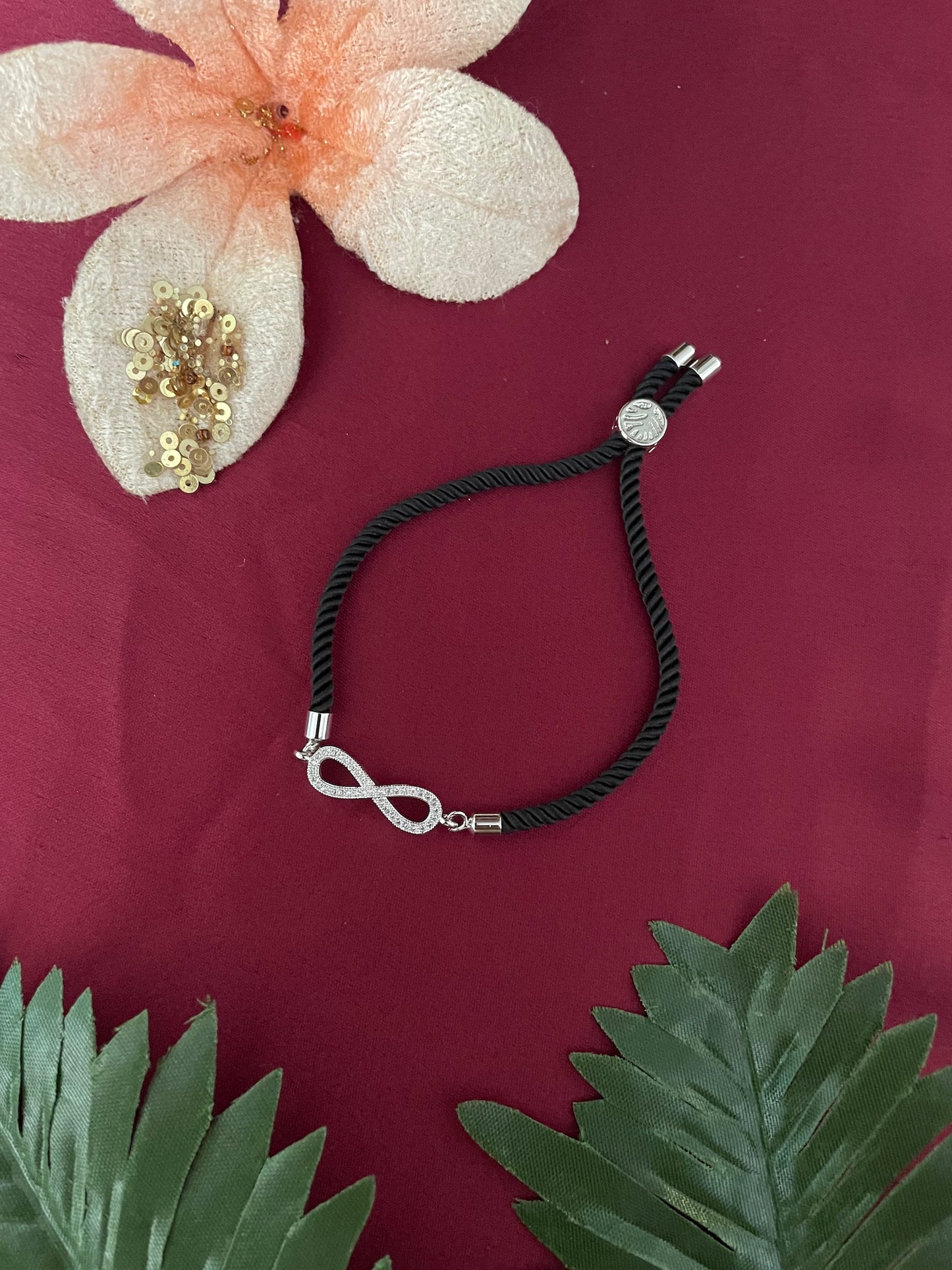 Silver Plated AD Infinity Rakhi Lumba