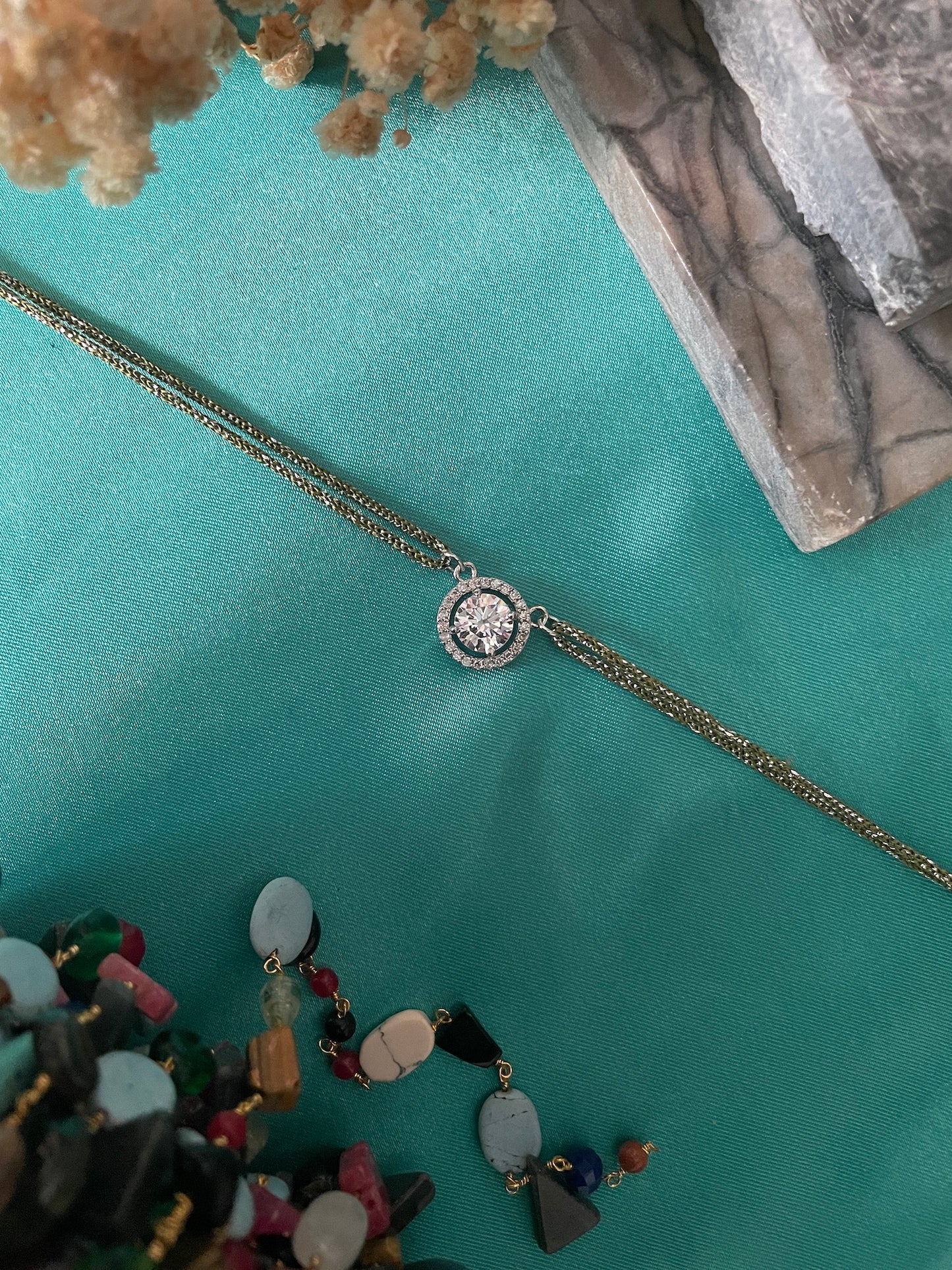 AD Round Rakhi Lumba