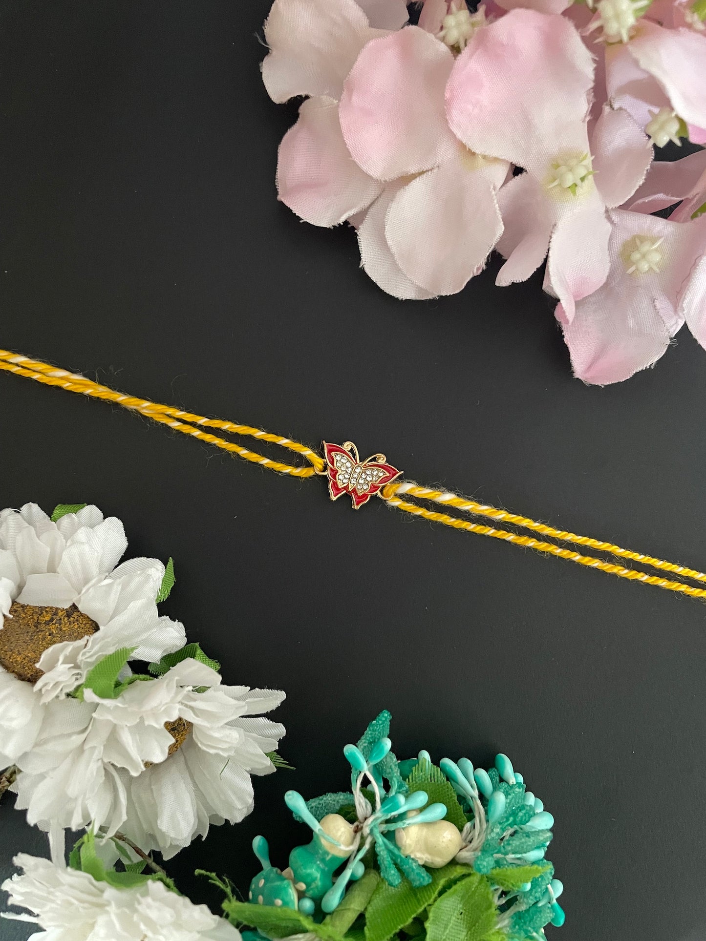 AD Red Butterfly Charm Rakhi Lumba