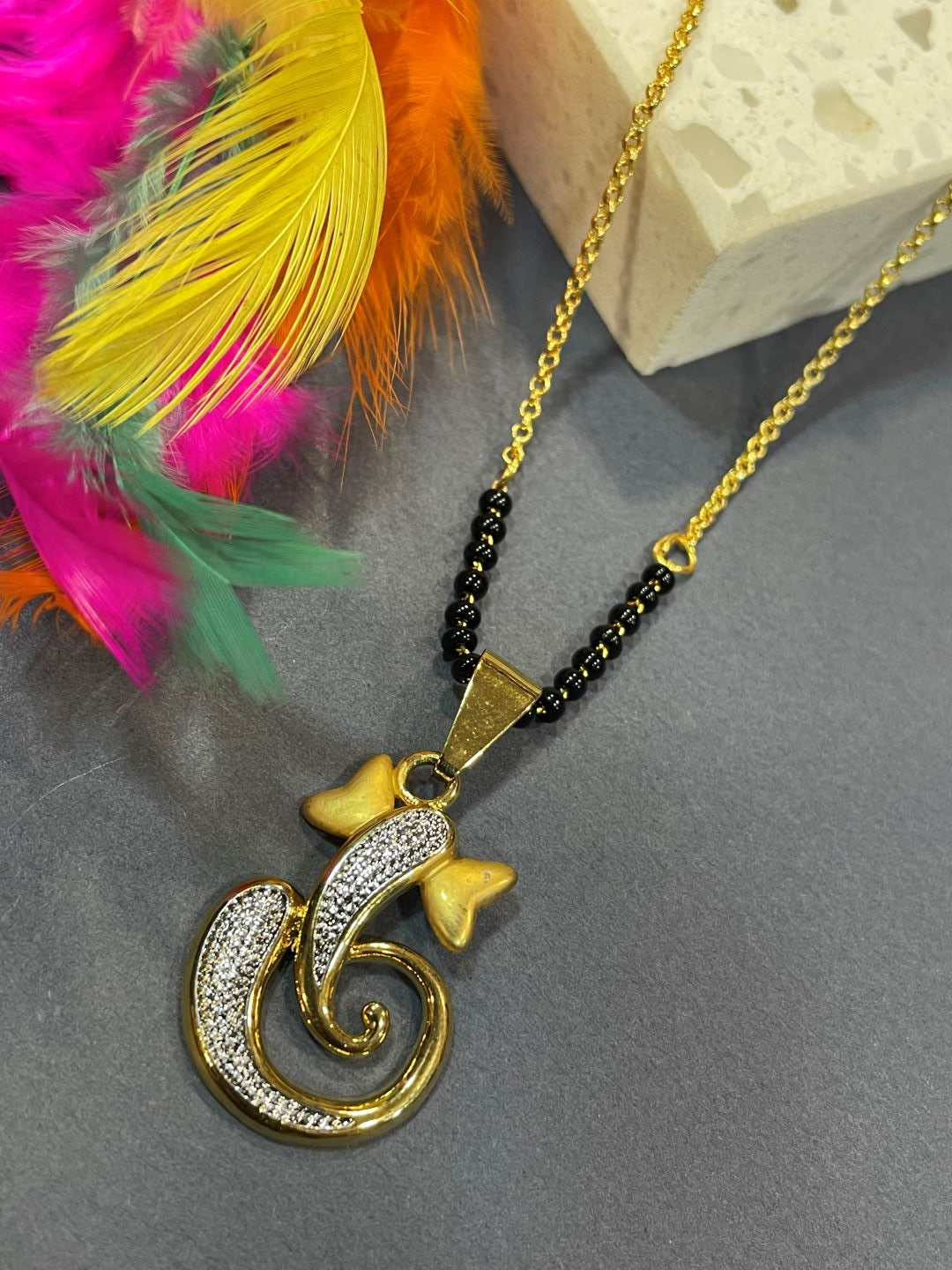 Short Mangalsutra/Necklace With a gold Silver Ganesha Pendant