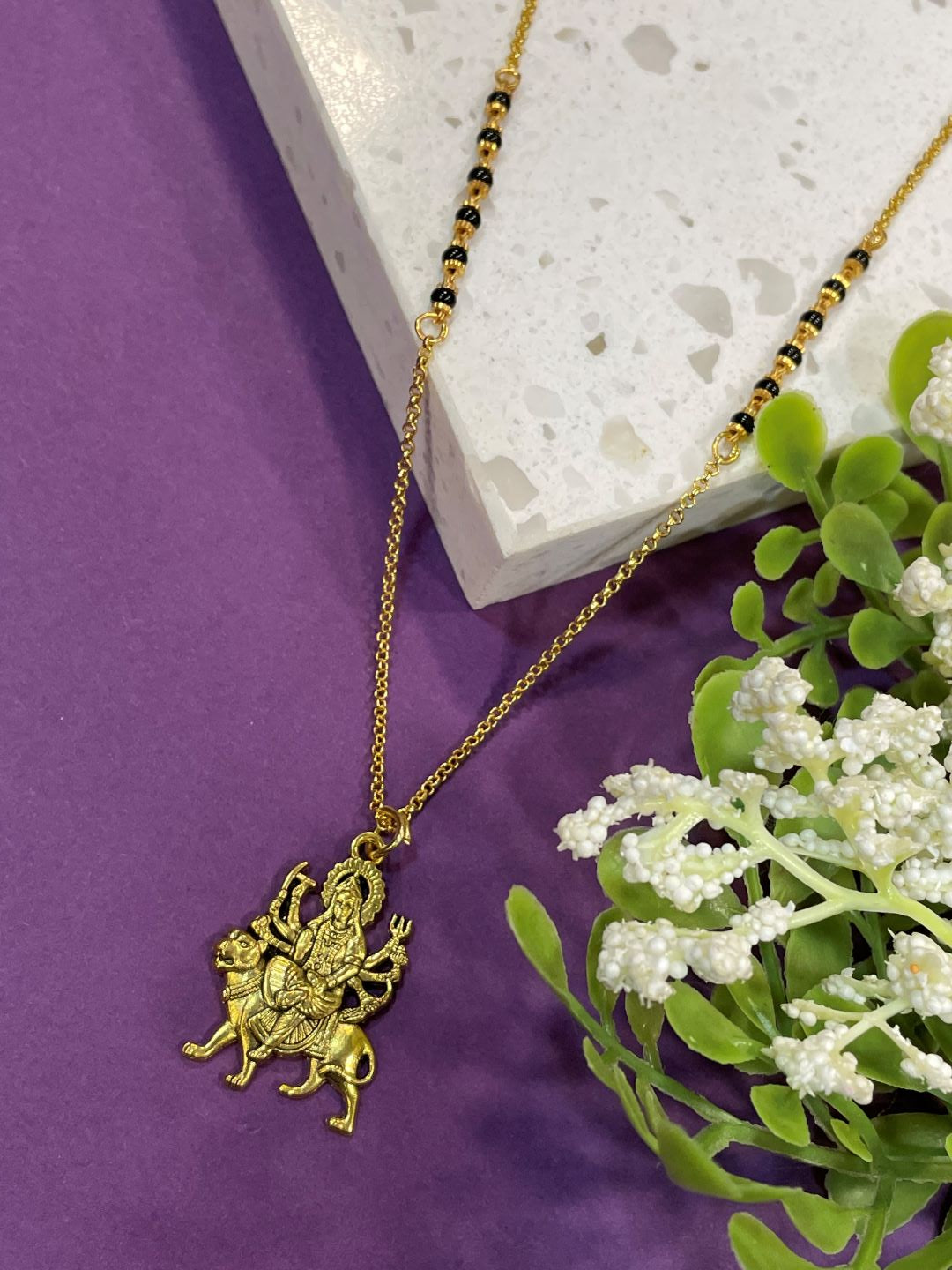 Short Mangalsutra/Necklace With a gold Plated Laxmi Pendant