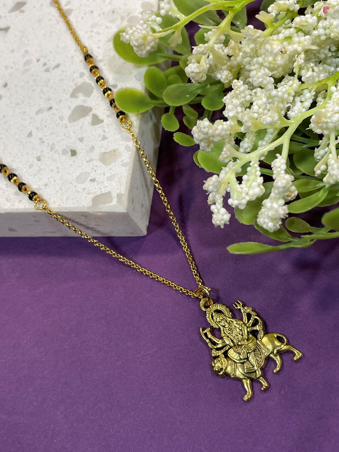 Short Mangalsutra/Necklace With a gold Plated Laxmi Pendant