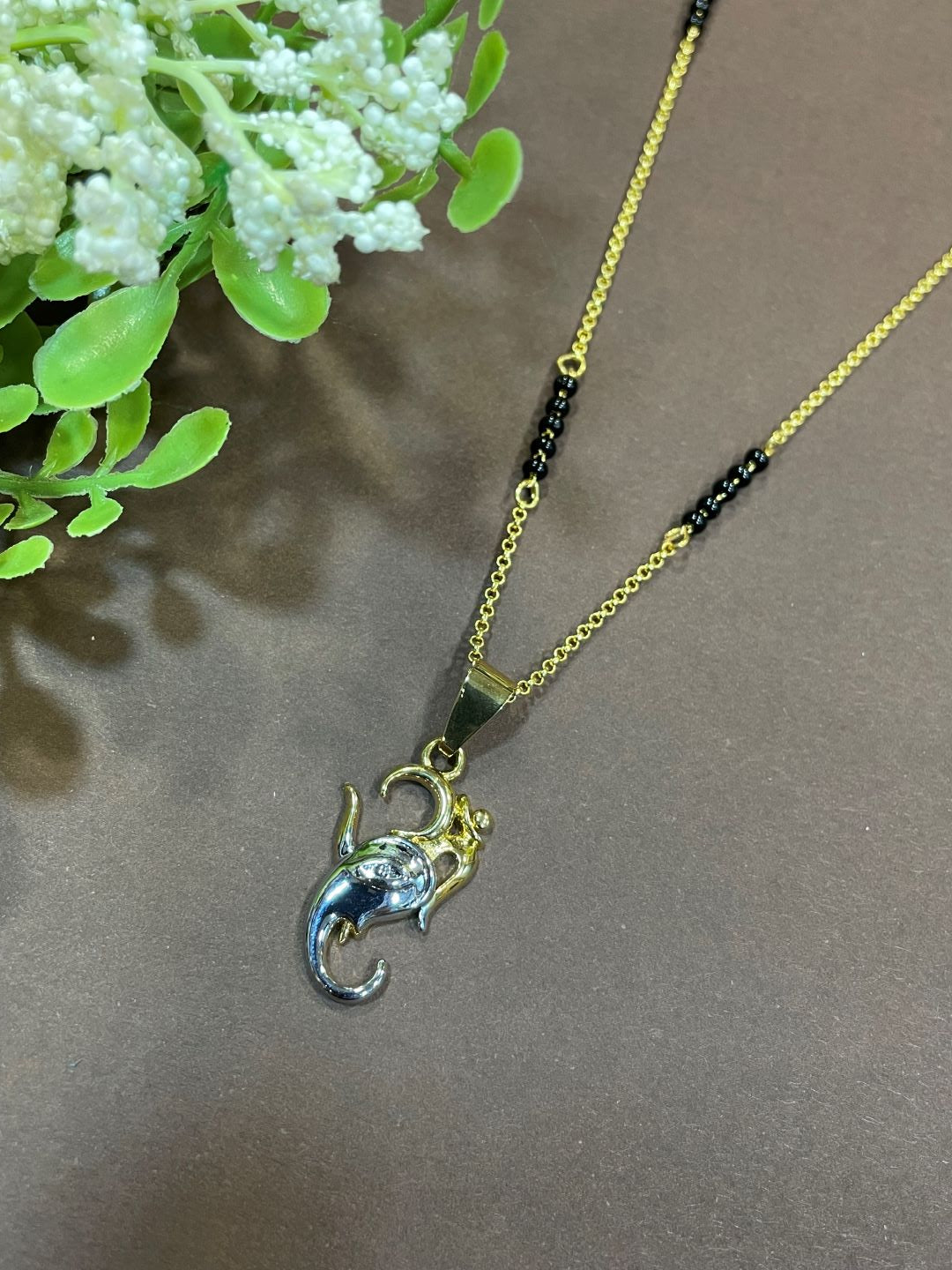 Short Mangalsutra/Necklace With a Om & Ganesha Pendant