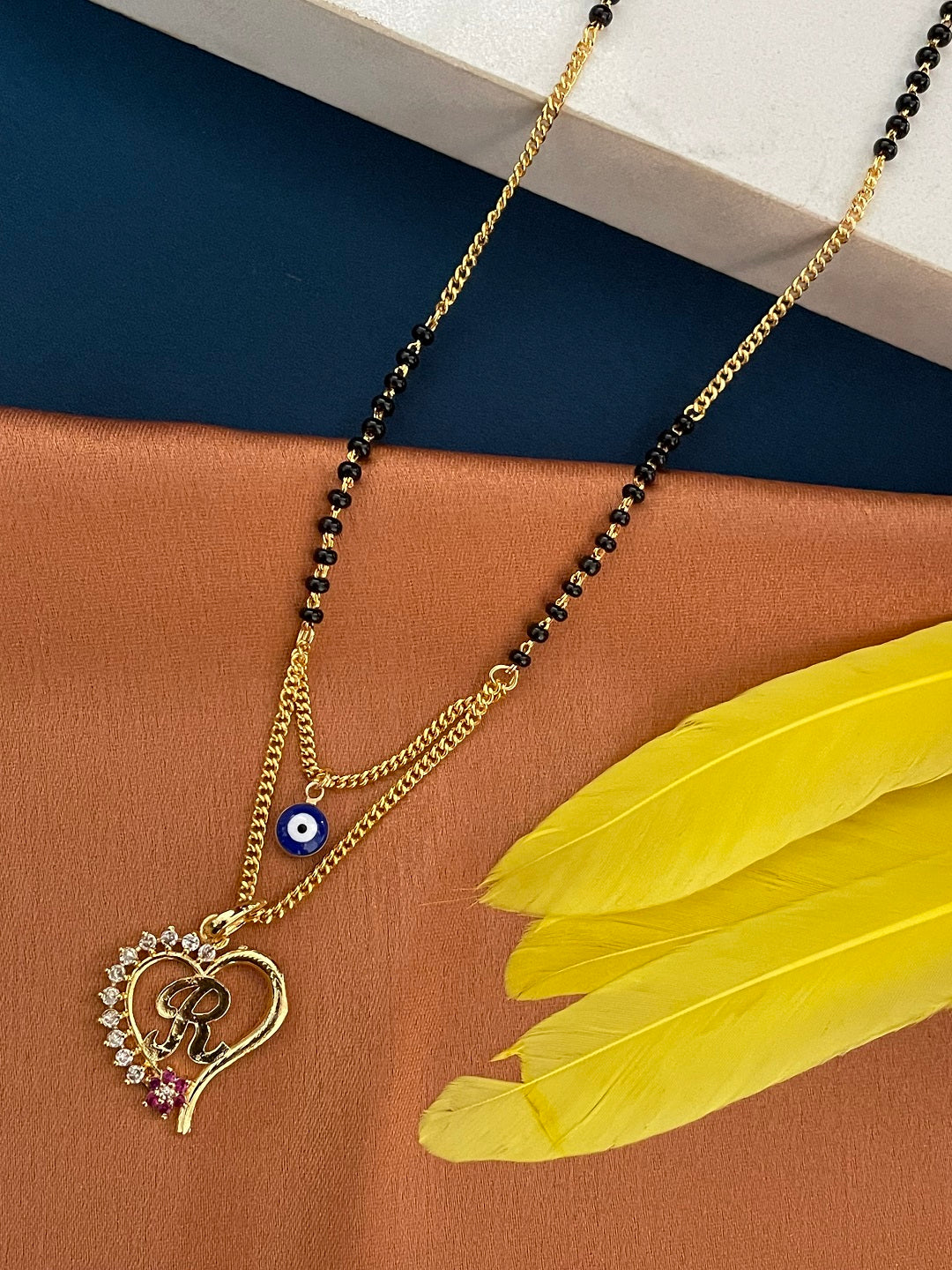 Heart Pendent with A-Z Cursive Letter AD Short Mangalsutra Designs (20 Inches)