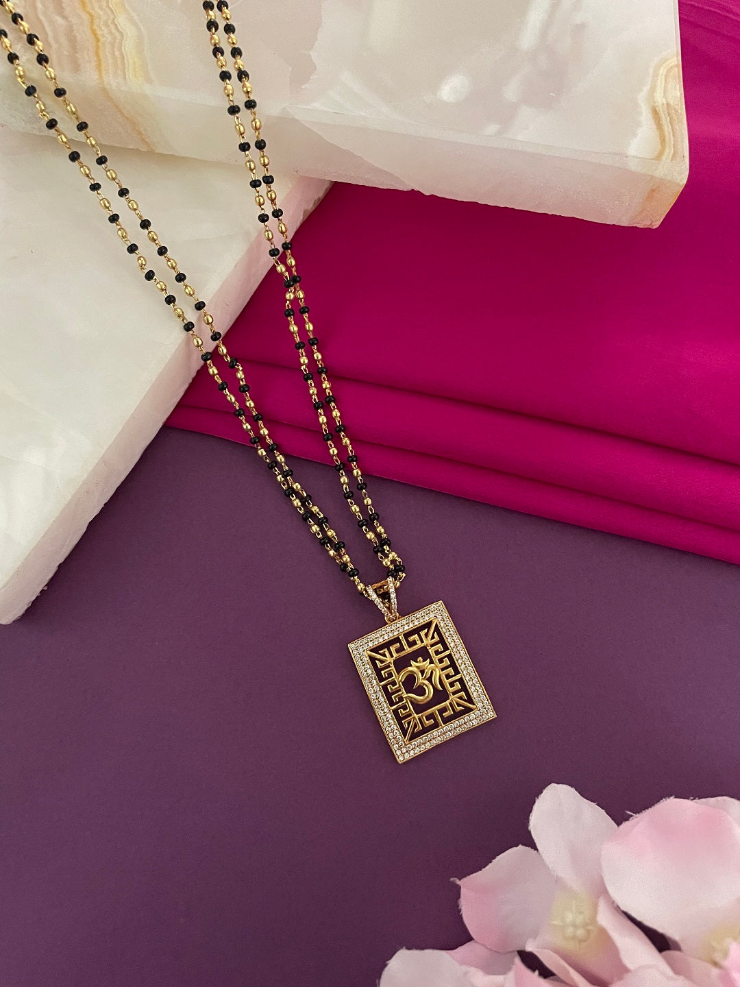 Modern Long Mangalsutra Designs American Diamond Om Pendant Simple Gold And Black Beads Chain