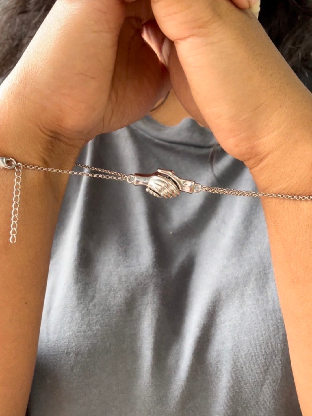 (Set of 2) Silver Plated Hand Holding Magnet Bracelets