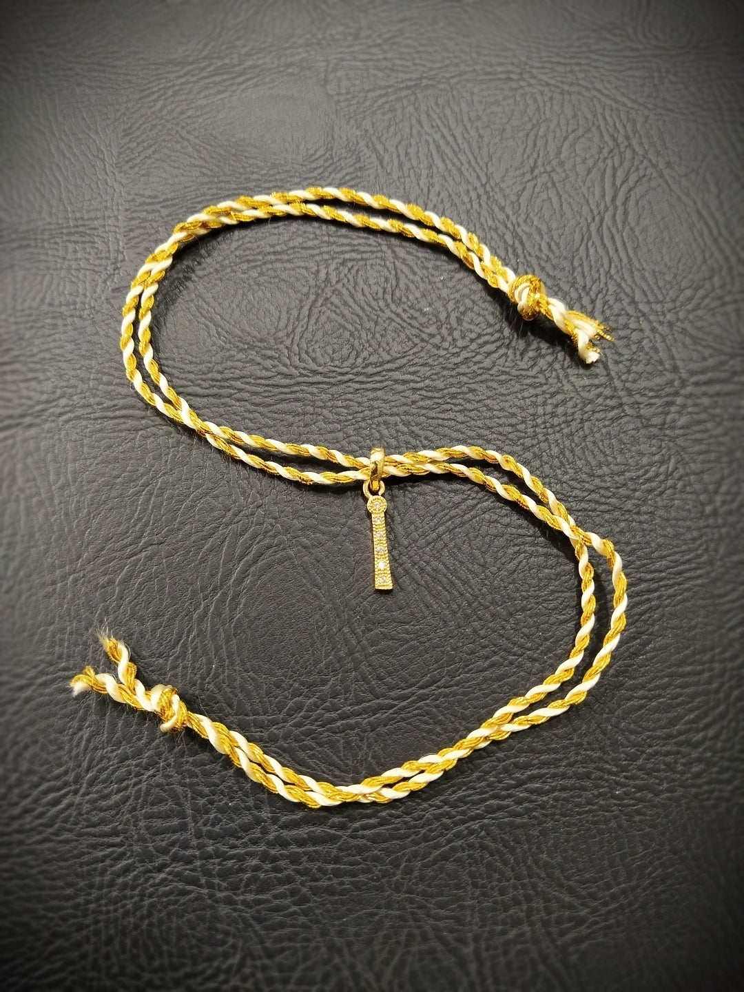 Initial Rakhi
