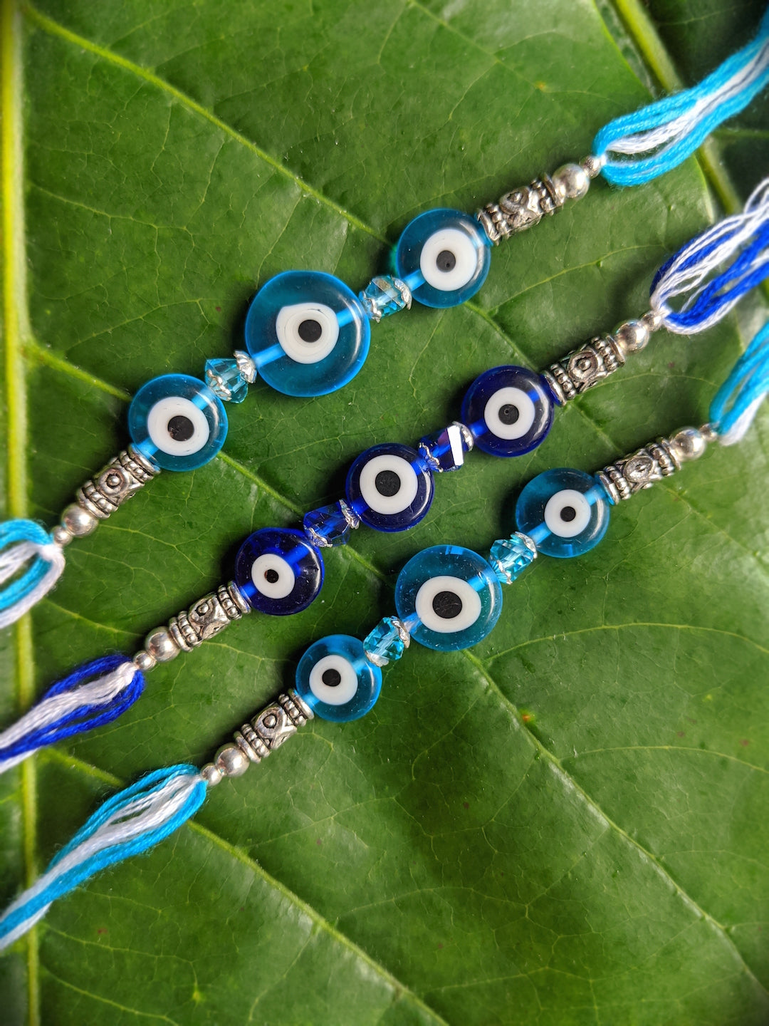 Rakhi, Rakhee, राखी, Rakri, Raksha-sutra, Rakshasutra, Raksha thread, Mauli,Thread, Thread, Gift Band, Wristband, Mauli Band, Raksha Band, Unique, indian, Pendant, Plated, Design, Designs, Latest, Stylish, Trendy, Fancy, Unique, Fabulous, Modern, Ethnic, Designer, Pattern, Fashion, new arrivals, Pattern, Evil Eye, Turkish Charm, Protector, Nazariya, Nazar Battu, Lucky Eye, Protective, Good Luck Charm, Mother Of Pearl, Turkish Pearl, Nazar Bead, Nazareth,