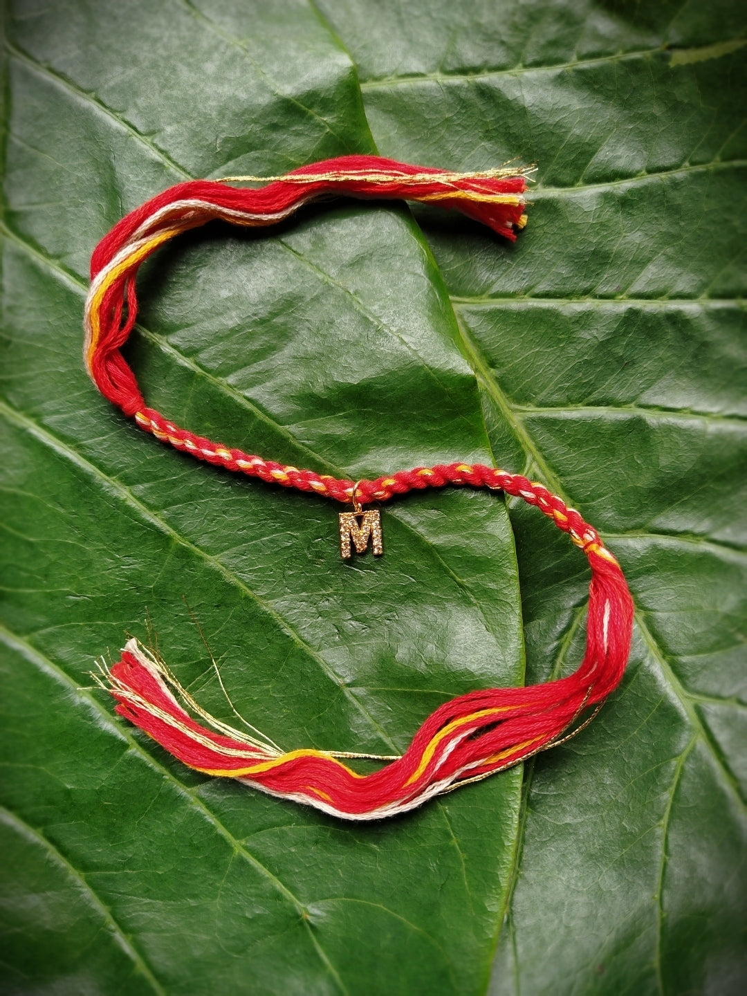 Initial Letter Rakhi