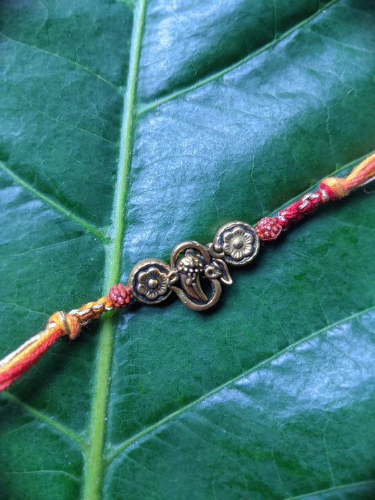Rakhi, Rakhee, राखी, Rakri, Raksha-sutra, Rakshasutra, Amulets, Charms, Raksha thread, Mauli, Thread, Gift Band, Wristband, Mauli Band, Raksha Band, Unique, online, indian, virtual, Pendant, Plated, Design, Designs, Latest, Stylish, Trendy, Fancy, Unique, Fabulous, Modern, Ethnic, Designer, Pattern, Fashion, New Arrivals, Pattern, gold, Colour, coloured, Pendant, Pendal, राखी, रक्षाबंधन, Ganesha, Ganapati, Om, Floral, Flower, Rudraksh,