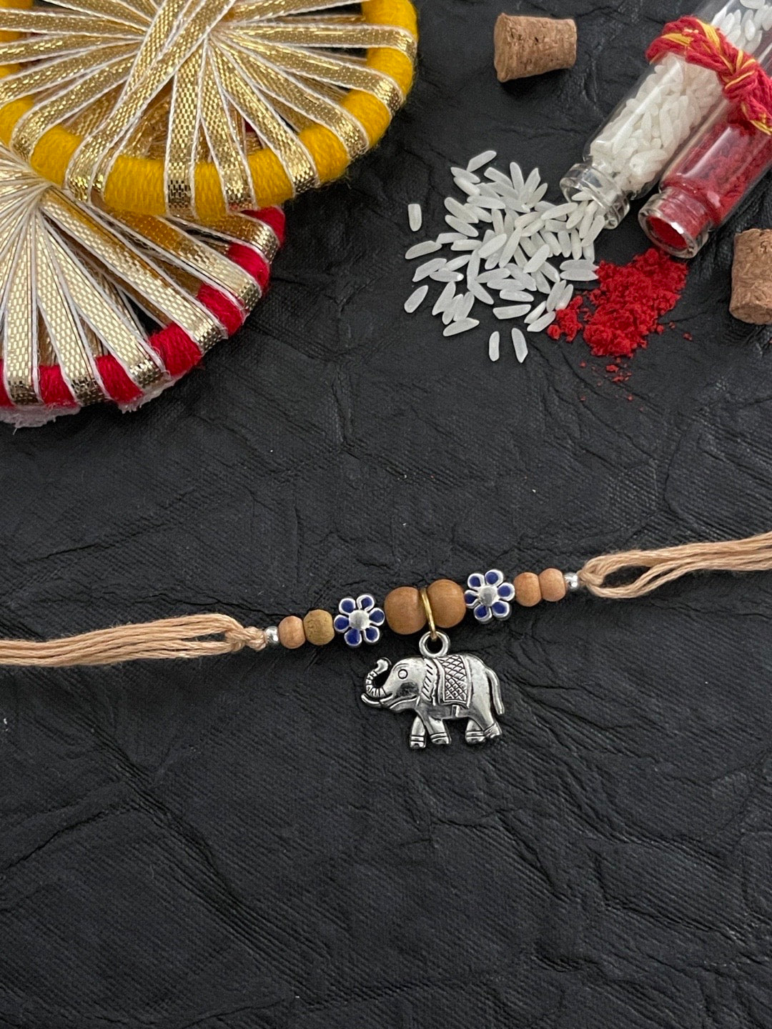 Beautiful Designer Chandan Rakhi Flower Designs With Elephant Charm Thread Rakhi For Raksha Bandhan