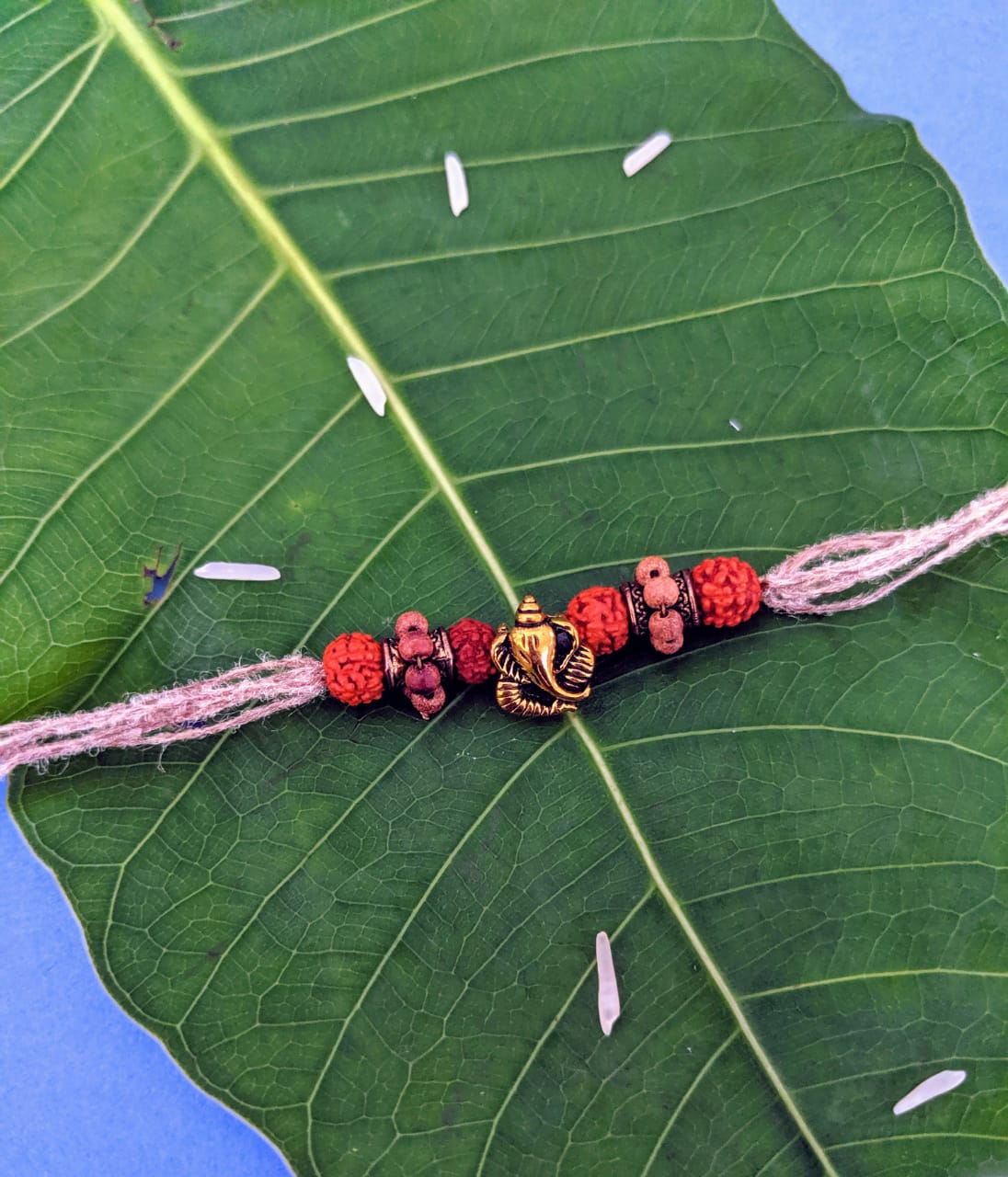 Trendy Rakhi Designs Ganesha with Rudraksha/Tulsi Beads Pendant
