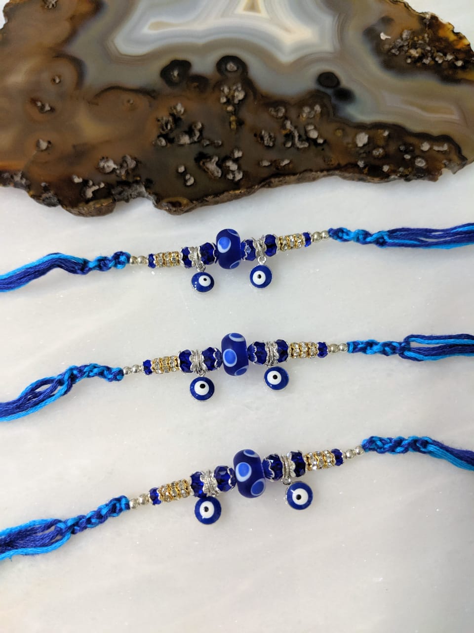 Digital Dress Room (Set of 3) Navy Blue Evil Eye Rakhi for Men Gold Ring Stone and Beads Rakhi