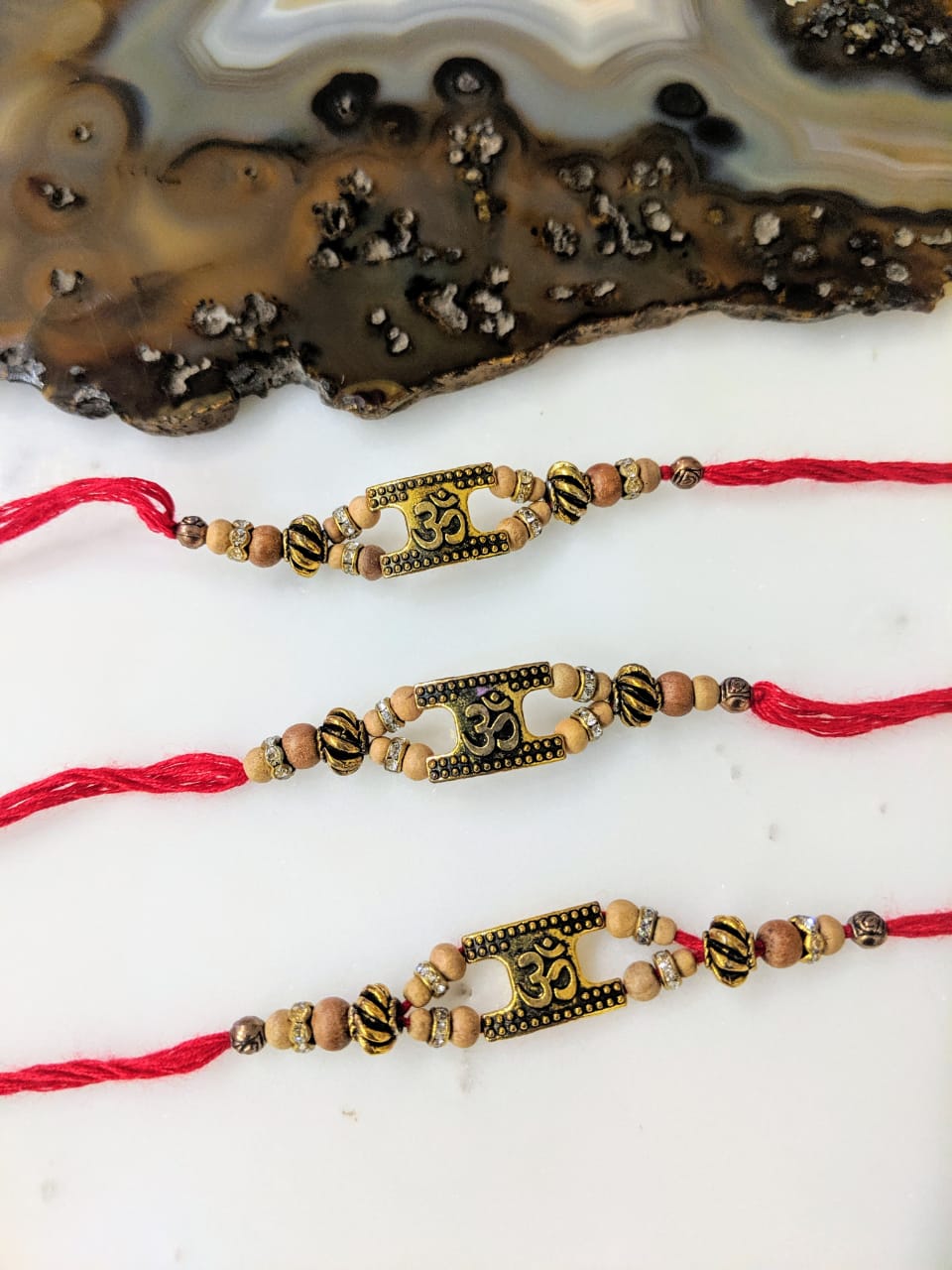 Digital Dress Room (Set of 3) Golden Rakhi with OM Design Tulsi Beads Red Thread Rakhi