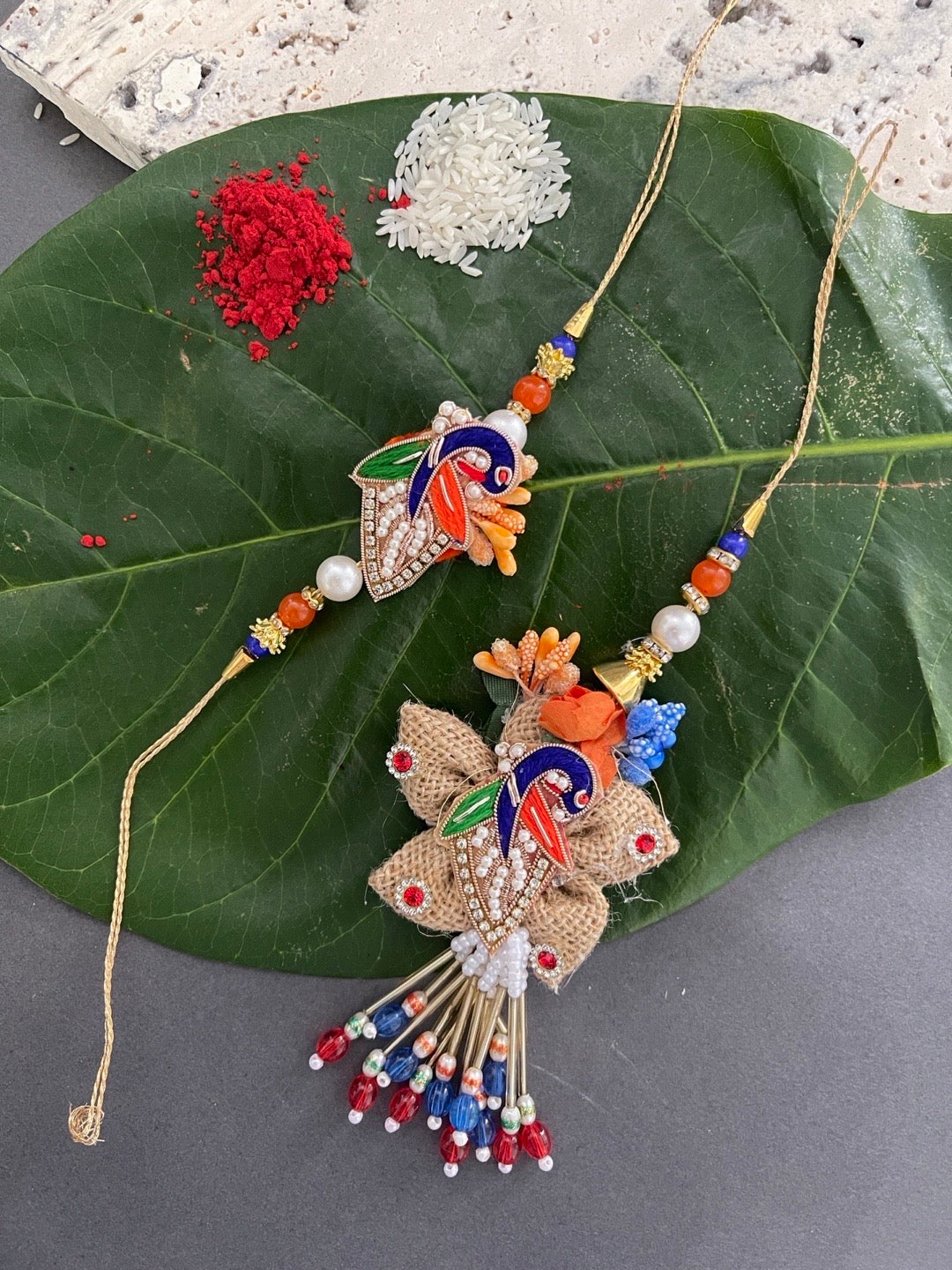 (Set of 2) Designer Rakhi And Lumba Set Peacock/Beads Designs Rakhi For Brother And Bhabhi