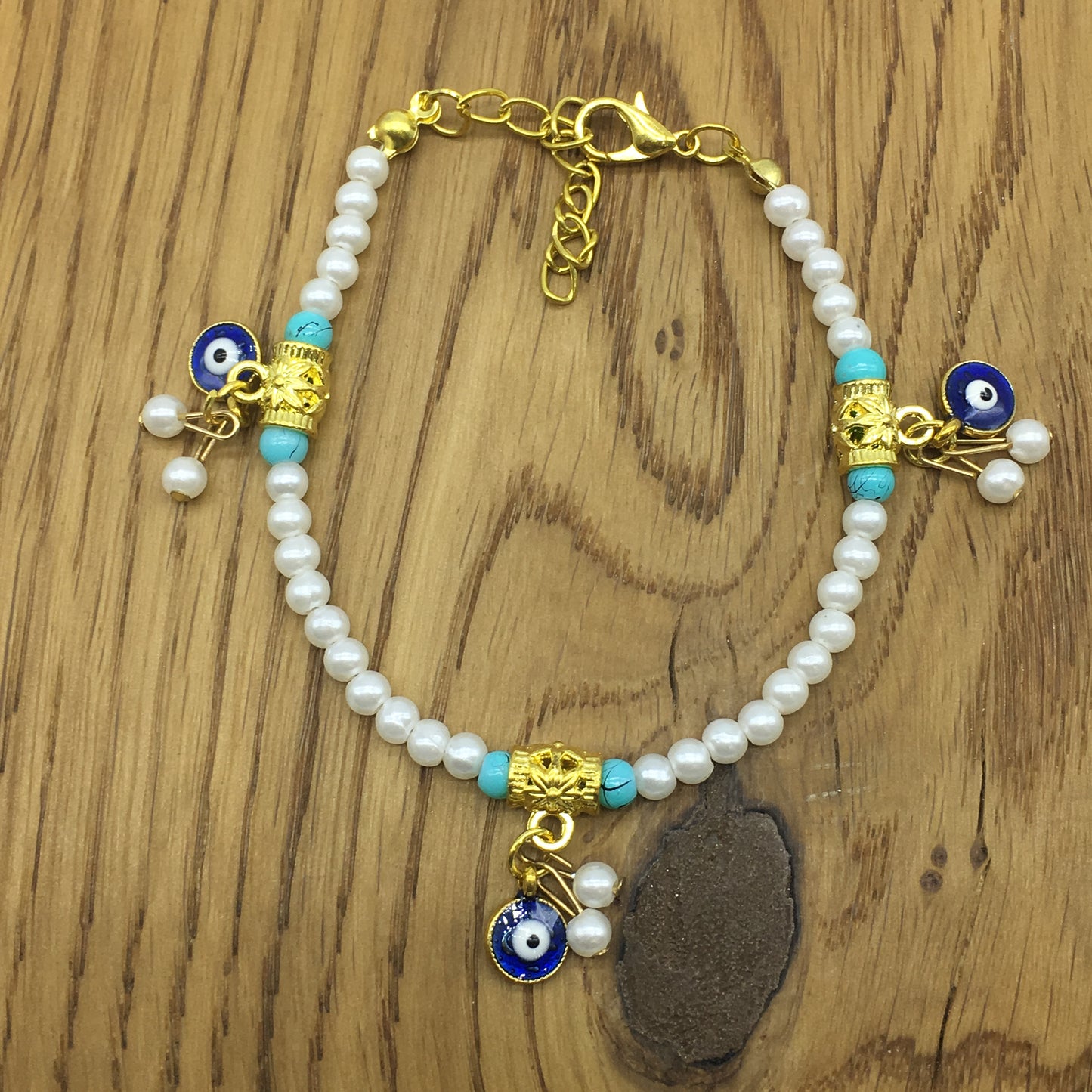 Rakhi, Rakhee, राखी, Rakri, Raksha-sutra, Rakshasutra, Amulets, Charms, Raksha thread, Mauli, Bracelet, Bracelets, Thread, Thread, Gift Band, Bracelet, Wristband, Mauli Band, Raksha Band, Unique, online, indian, virtual, designer, Pendant, Plated, Pearl, Pearls, Evil Eye, Turkish Charm, Protector, Nazariya, Nazar Battu, Lucky Eye, Protective, Good Luck Charm, Mother Of Pearl, Turkish Pearl,