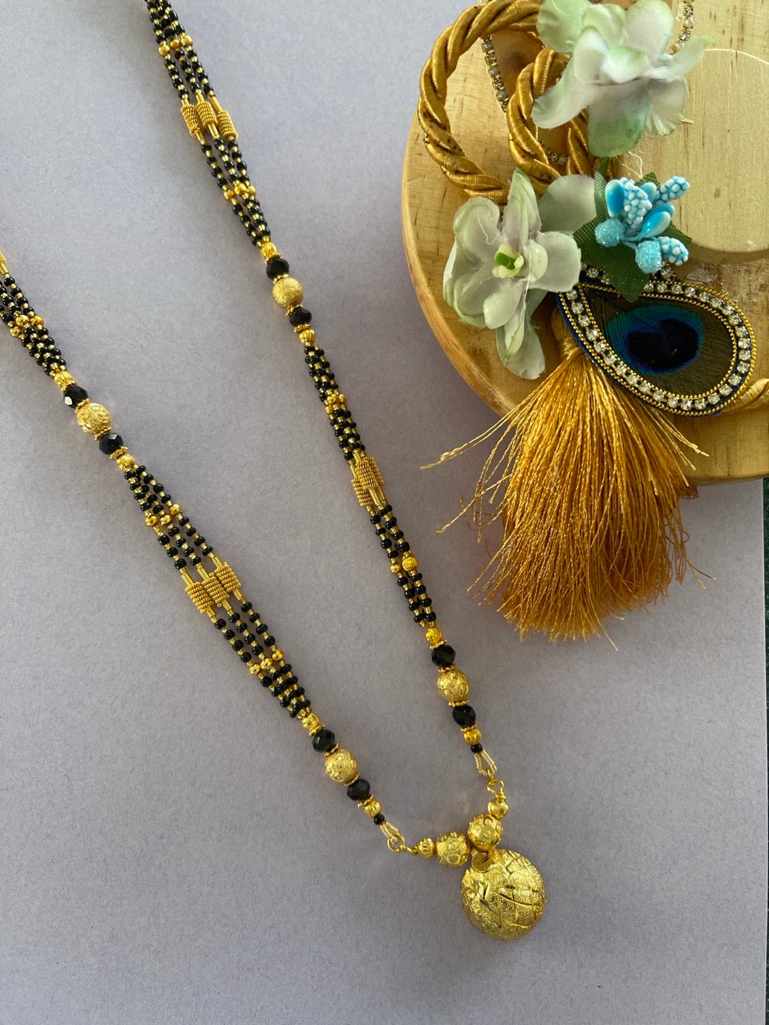 short gold mangalsutra designs latest