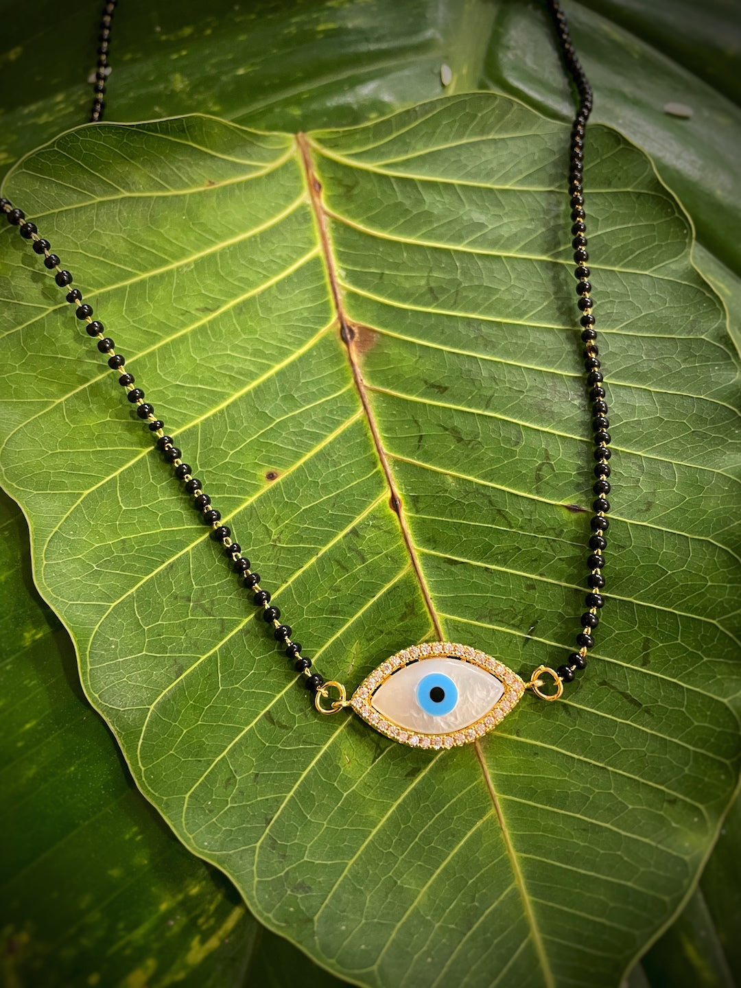 Evil Eye Gold Plated Short Mangalsutra Latest Design Tanmaniya/Black Beads Chain (17 Inches)