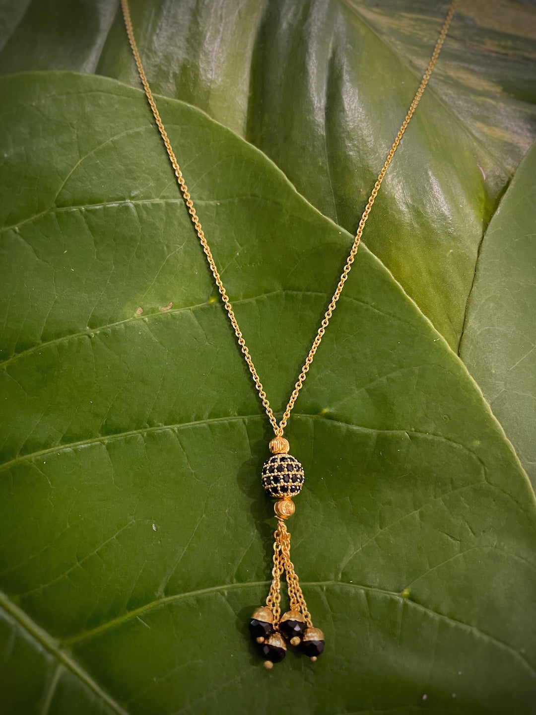 Short Mangalsutra Designs Gold Plated American Diamond Studded Chain with Black Beads (20 Inches)