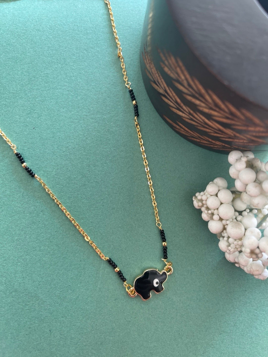 Simple Modern Short Mangalsutra Designs Elephant Evil Eye Pendant Traditional Black Beads Gold Chain