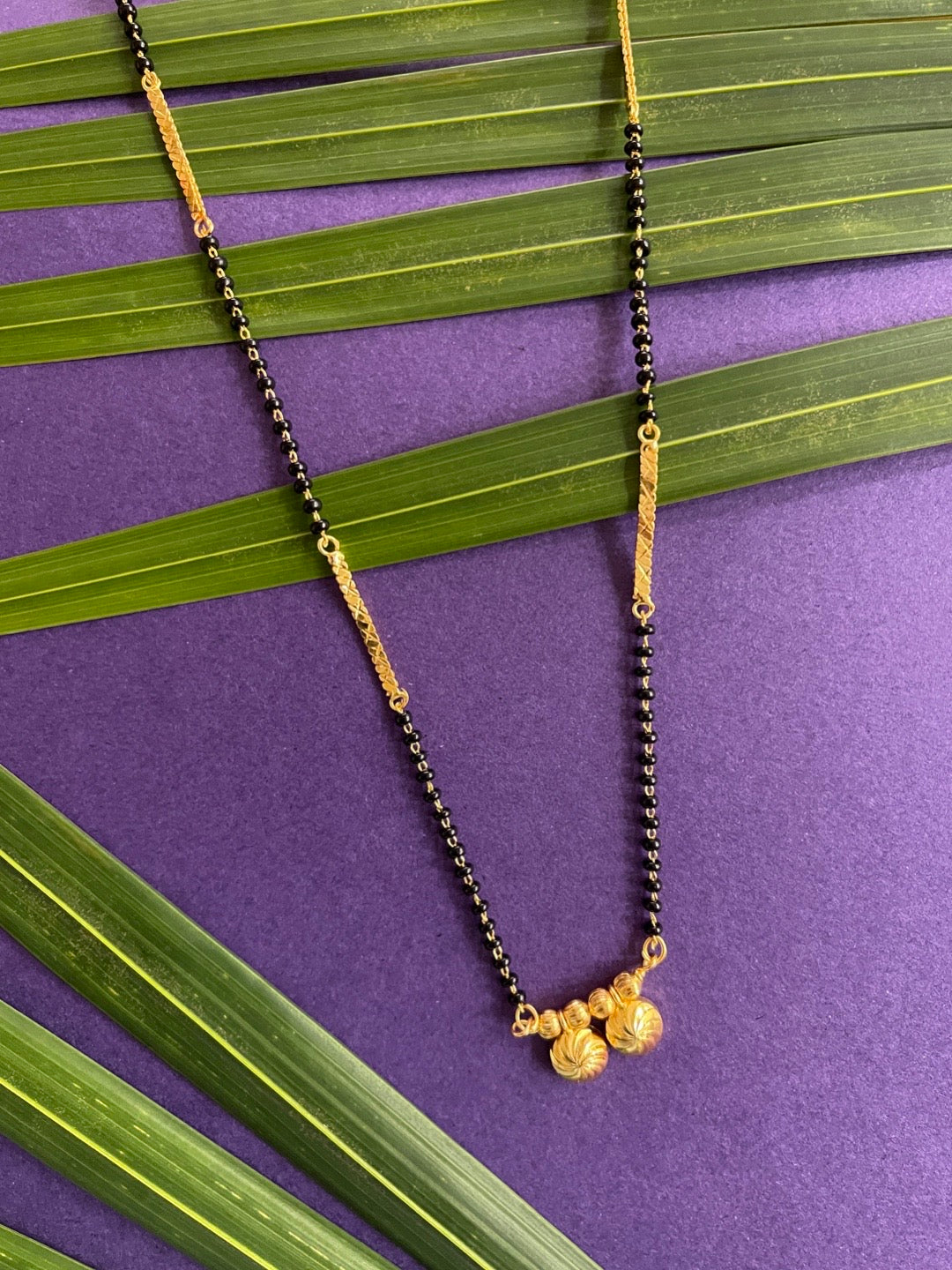 short gold mangalsutra designs latest