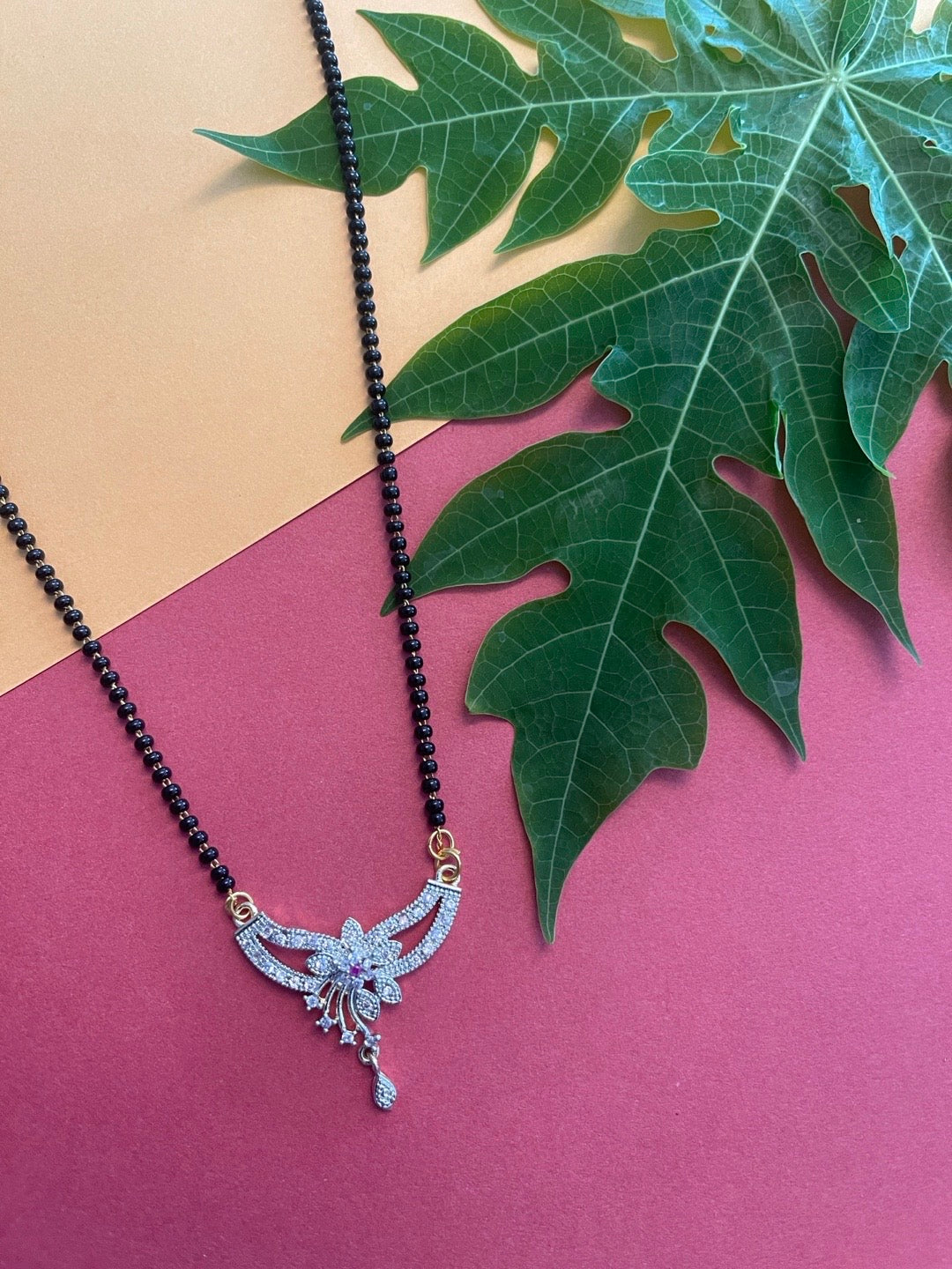 Trendy Short Mangalsutra Designs American Diamond Flower Pendant Simple Black Beads Chain