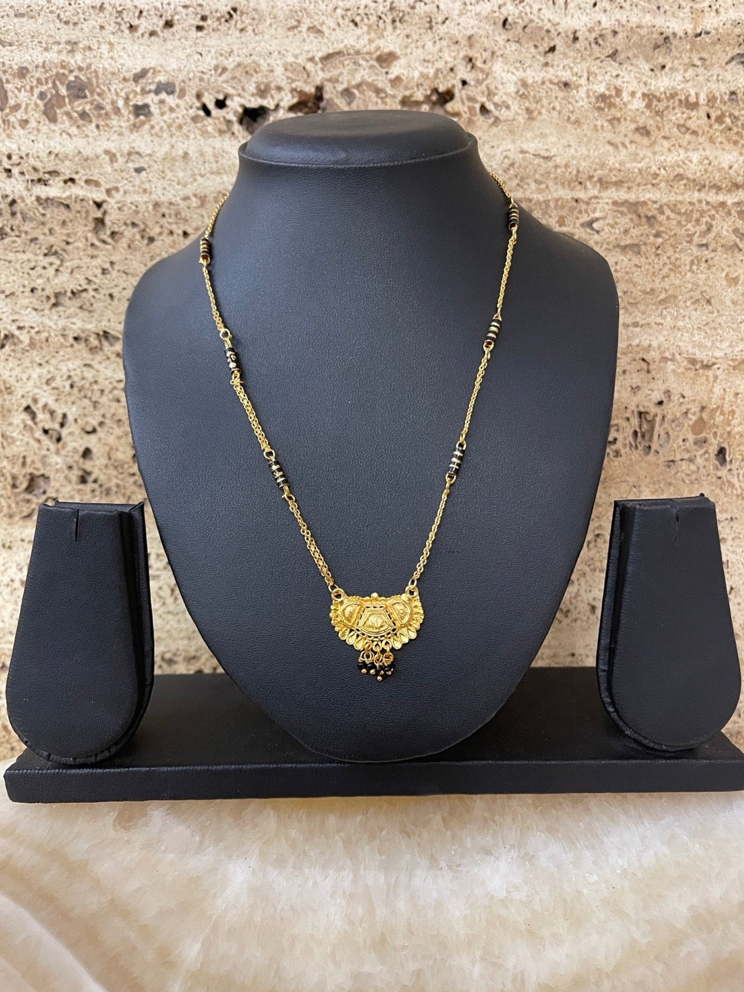 short gold mangalsutra designs latest