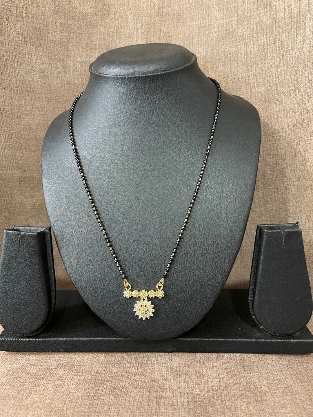 short gold mangalsutra designs latest