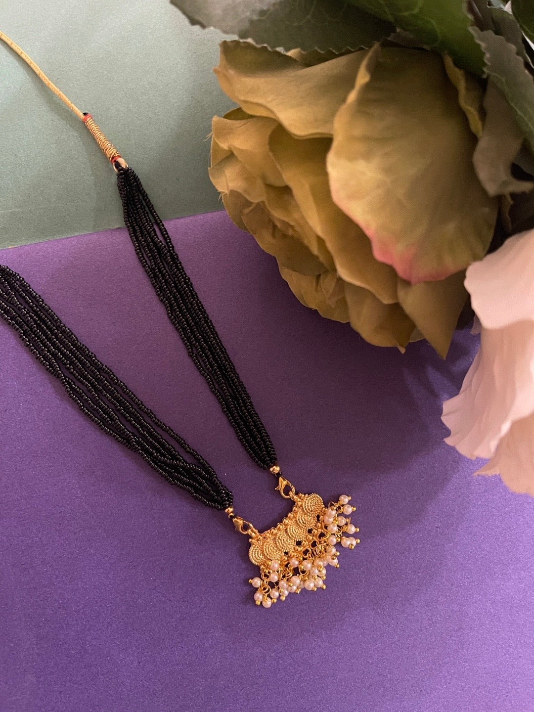 short gold mangalsutra designs latest