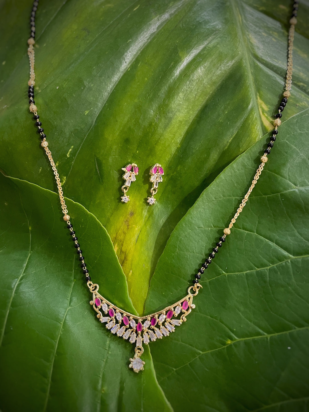 Short Mangalsutra Designs Set with Earrings American Diamond Studded Pendant (21 Inches)
