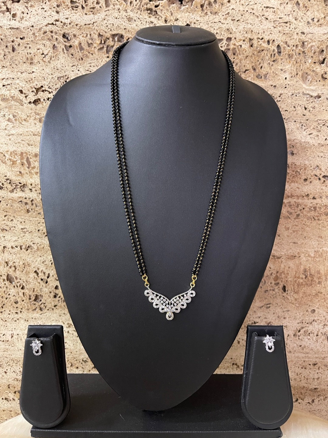 Long american diamond mangalsutra Clearance