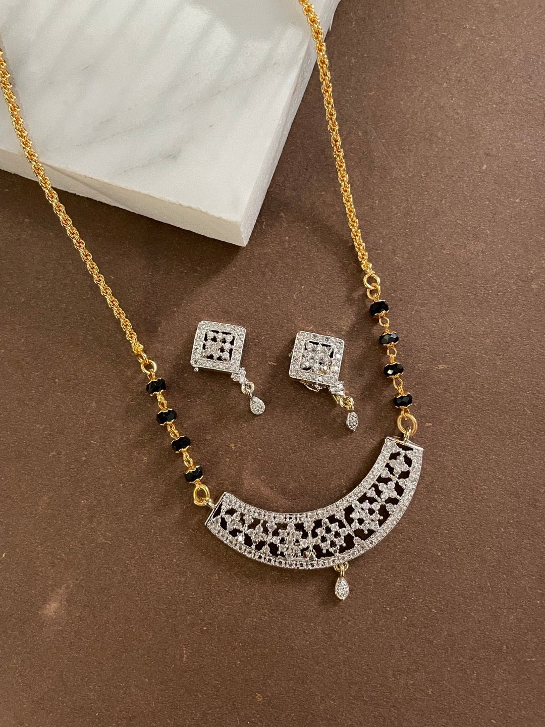 Gold Plated Long Mangalsutra With Earring Set Fancy American Diamond Pendant Design