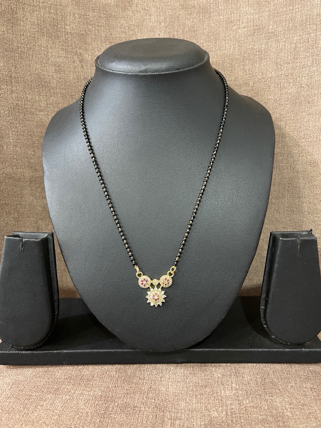 short mangalsutra designs in gold