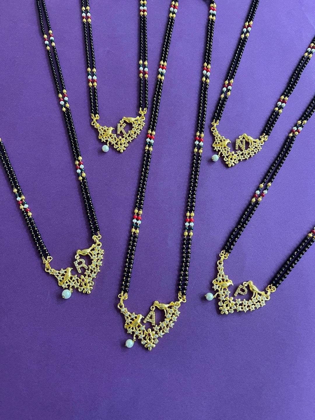 letter name mangalsutra design
