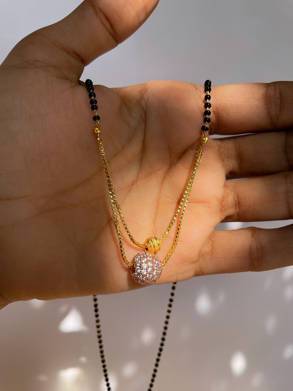 Short Mangalsutra Designs Gold Plated Rose Gold American Diamond Pendant Layered Mangalsutra (21 Inches)