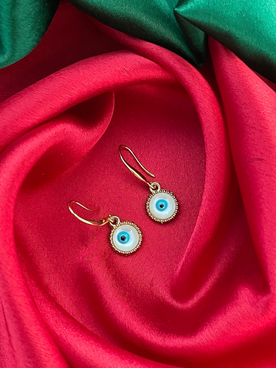 Round White Evil Eye Dangler Earrings