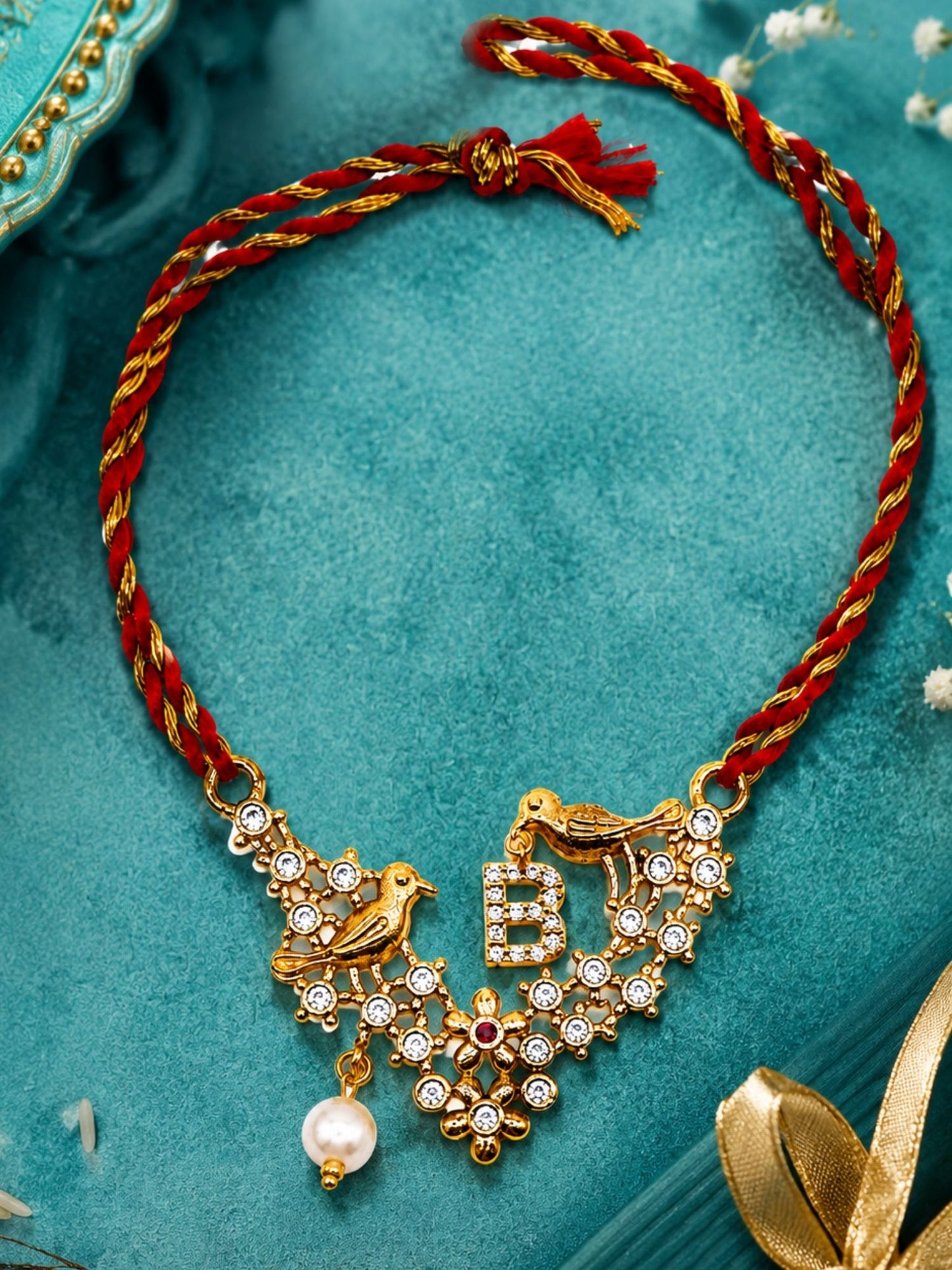 Letter Name Rakhi Designs Alphabet AD Gold Plated with Pearl Customized Pendant Raksha Bandhan