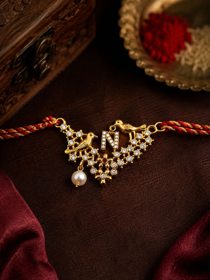 Letter Name Rakhi Designs Alphabet AD Gold Plated with Pearl Customized Pendant Raksha Bandhan