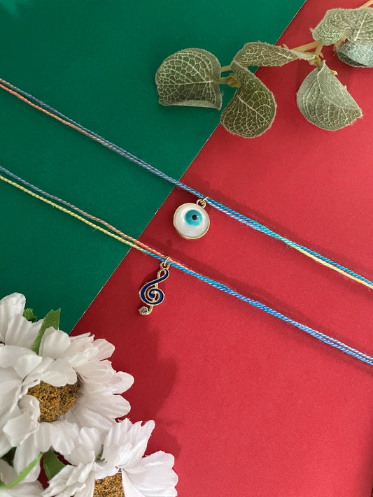 (Set of 2) Musical Note/Evil Eye Charm Rakhi Lumba