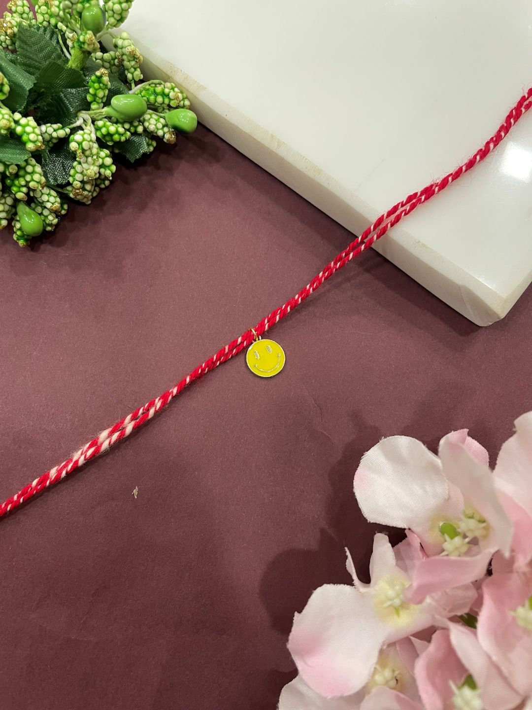 Smiley Charm Rakhi Lumba