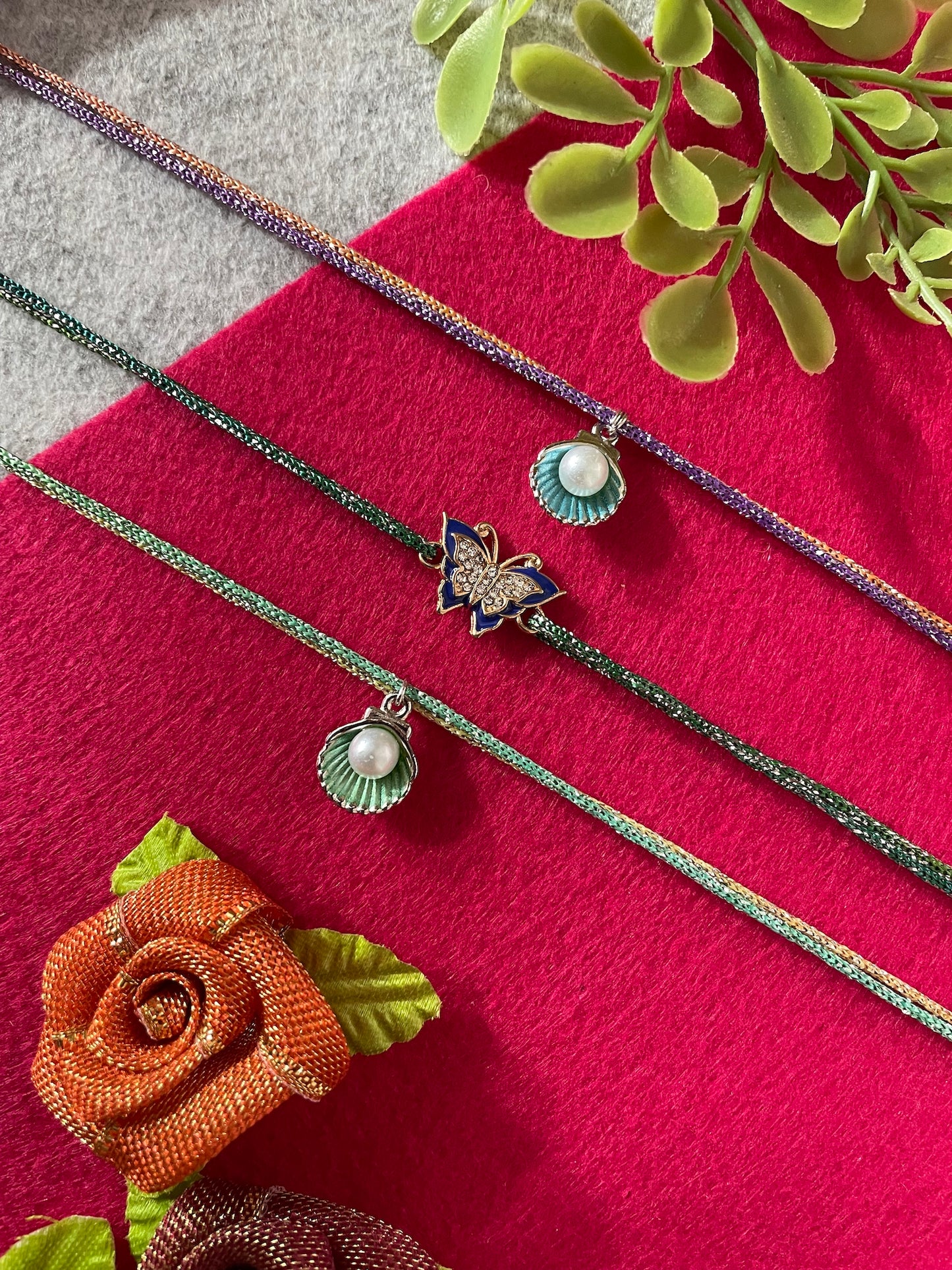 (Set of 3) Butterfly Shell With Pearl Charm Rakhi Lumba