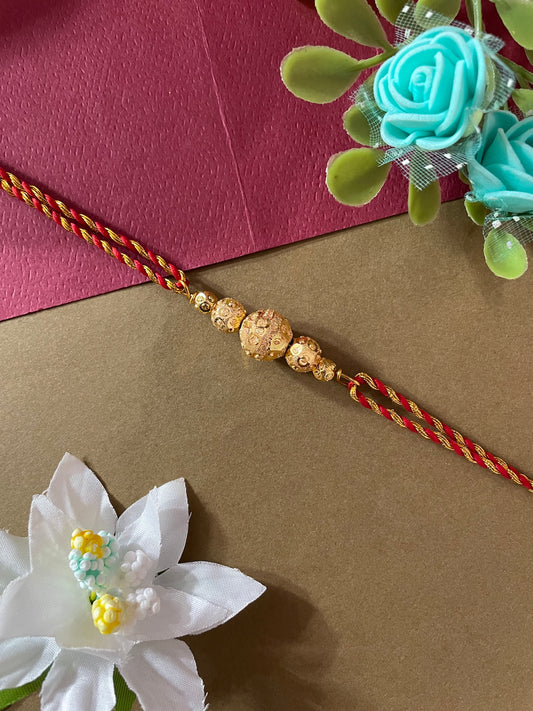 Gold Plated Ball Rakhi Lumba