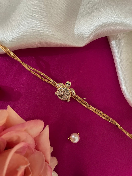AD Tortoise Charm Rakhi Lumba
