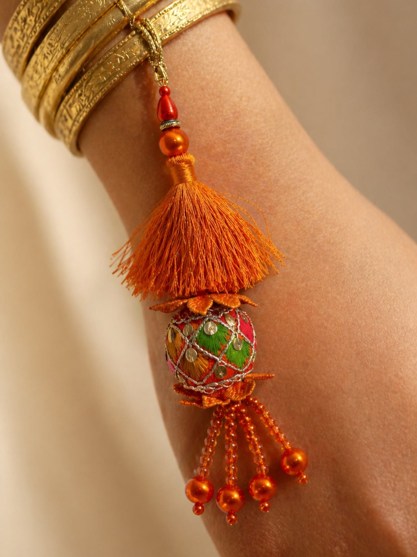 (Set of 2) Bhai Name Orange Tassel Lumba Rakhi Bhaiya Bhabhi
